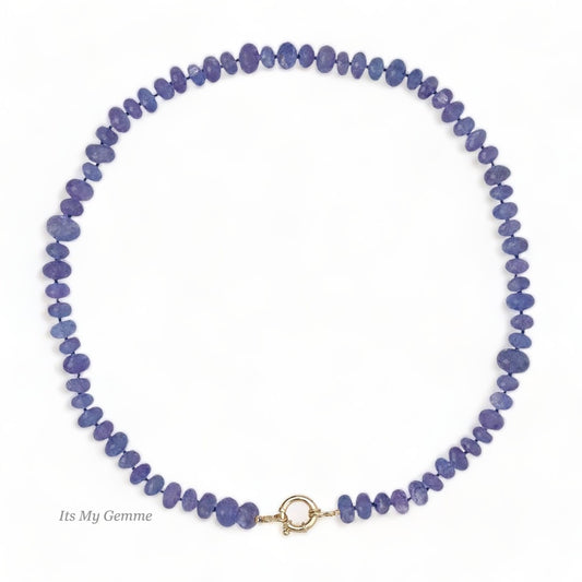 purple tanzanite beaded necklace with a gold clasp