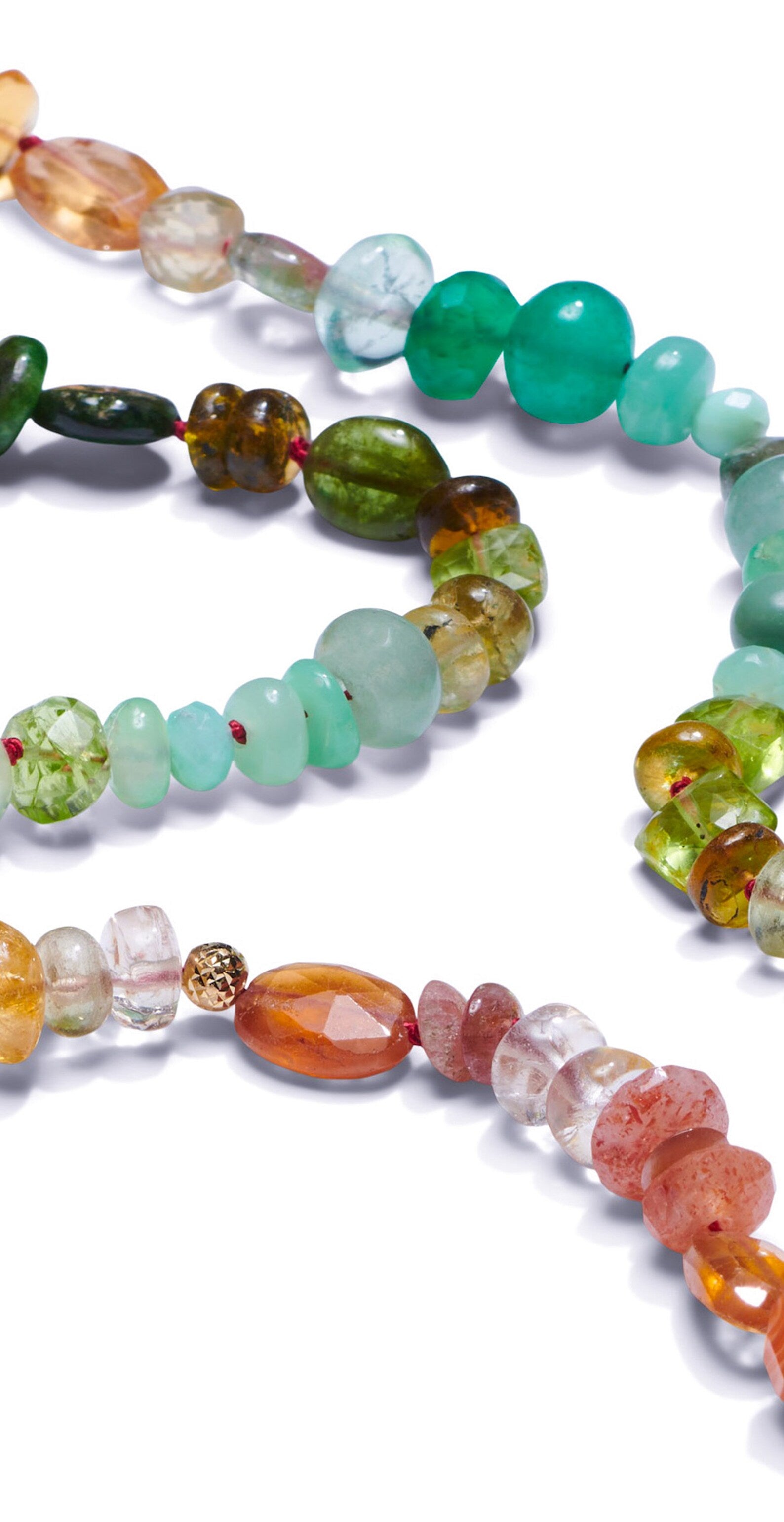 Beaded gemstone necklace with emeralds