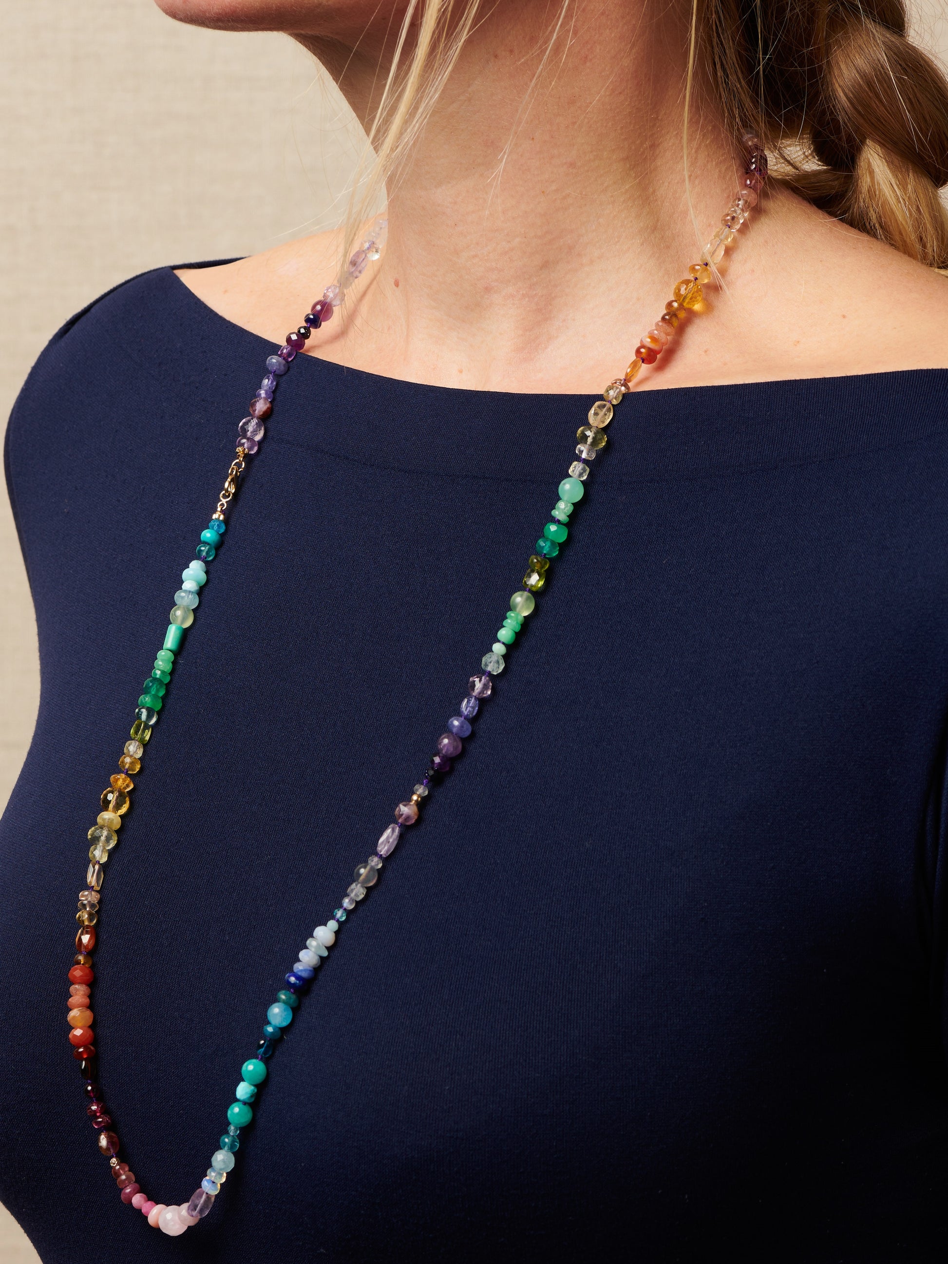 Long Rainbow Gemstone Necklace around neck