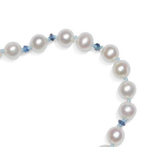 detail of knotted pearl sapphire necklace