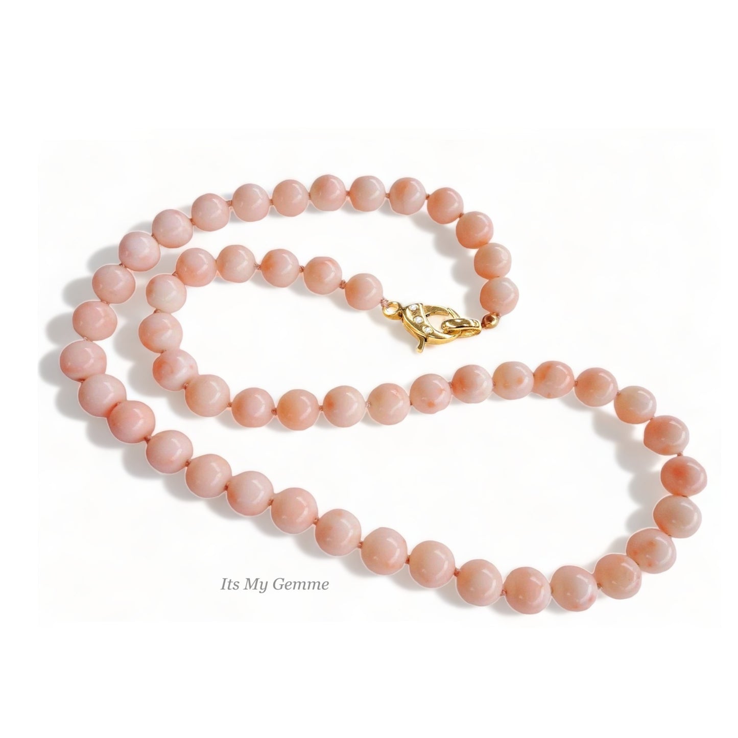 pink angel skin coral beaded necklace with gold clasp